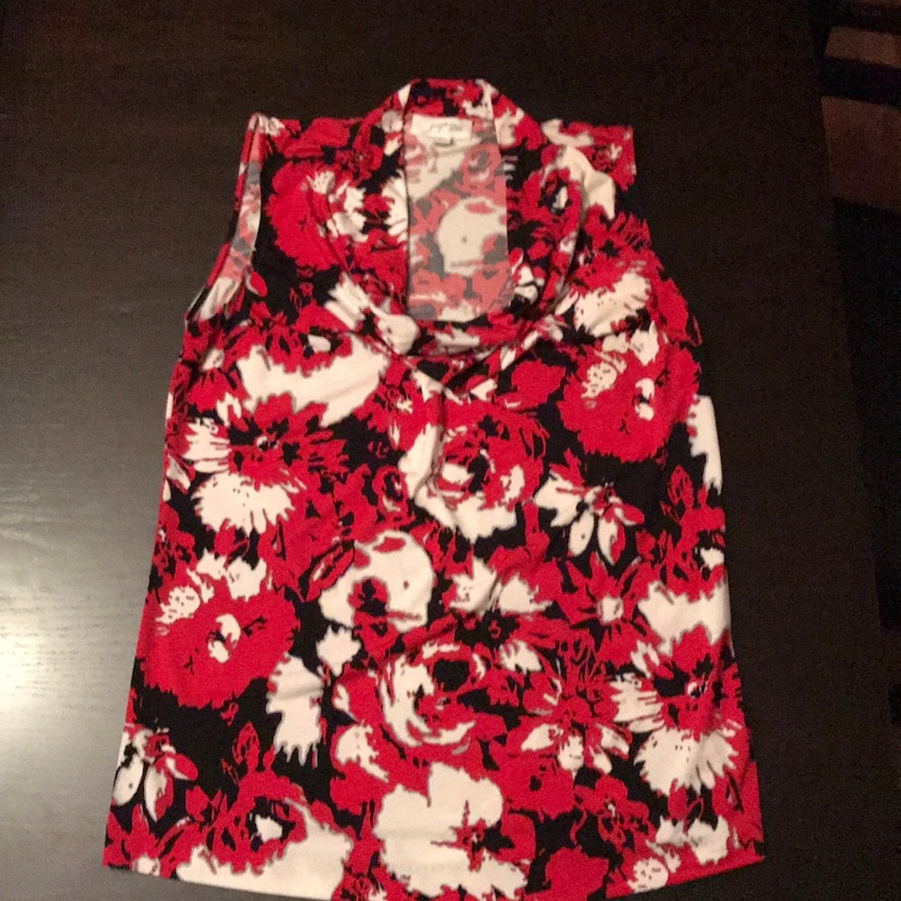 A sleeveless dress blouse